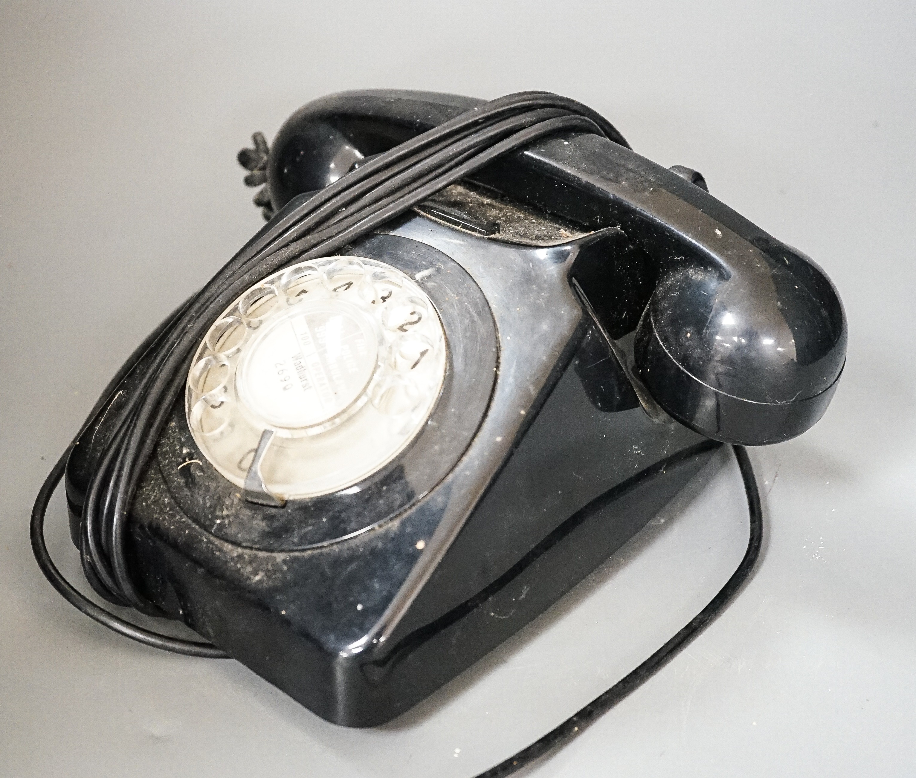 A black Bakelite telephone